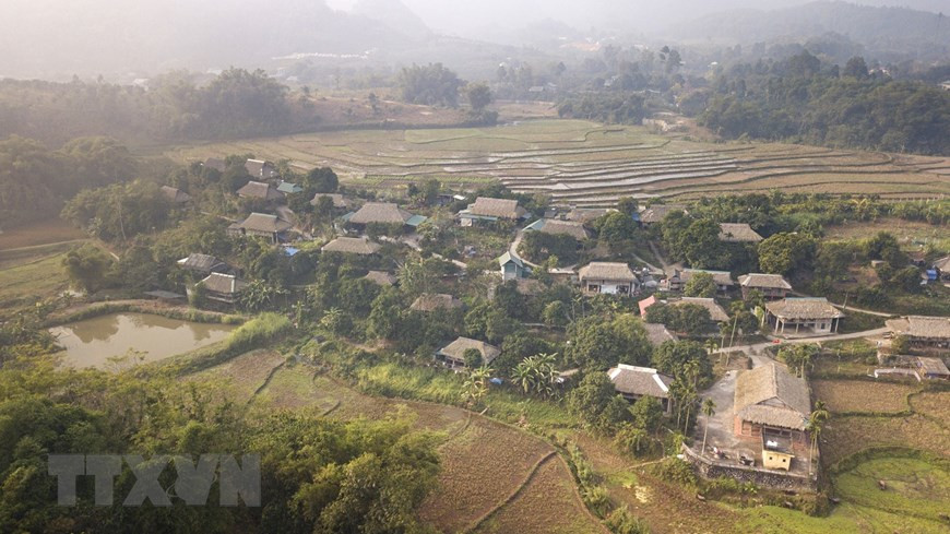 Giang Mo village is located at the foot of Mo Mountain, surrounded by rice fields and mountains. (Photo by VNA)
