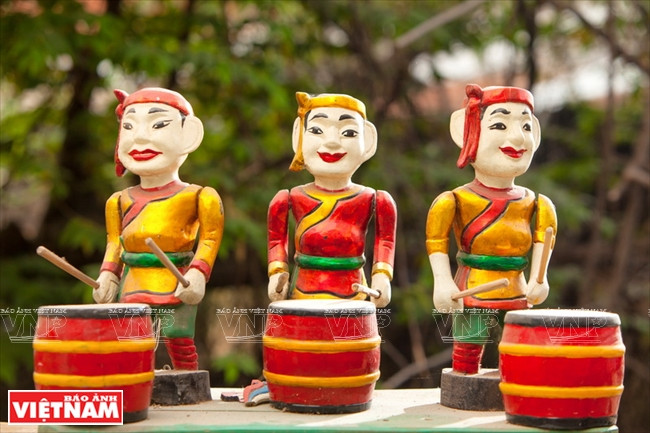 Characters in the 'Festival drums' show (Photo: VNA)