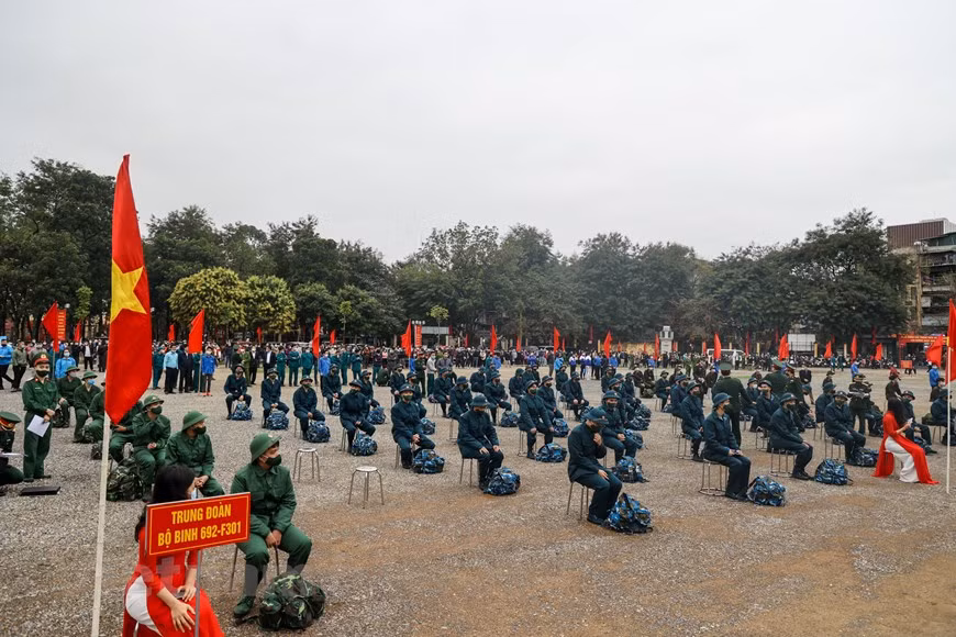 Hanoi and 20 other provinces and cities nationwide hold ceremonies for hand-over of newly-conscripted soldiers to the army. (Photo: Vietnam+)