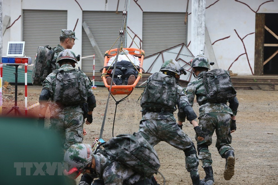 Chinese armed force attends the joint drill (Photo: VNA)