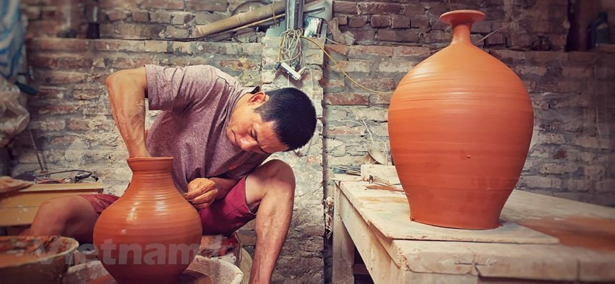 His first batches of pottery products looked so simple that his neighbours were doubt about his talent (Photo: Vietnam+)