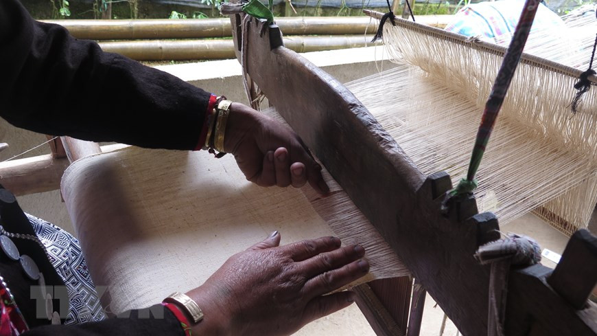 Brocade weaving is time-consuming (Photo: VNA)