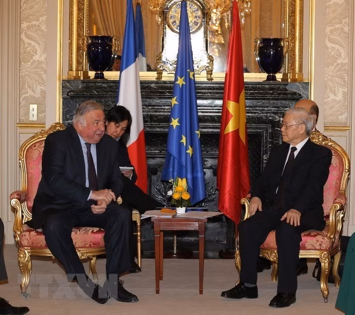 General Secretary Nguyen Phu Trong meets with French Senate President Gerard Larcher during an official visit to France from March 25- 27, 2018, March 26, 2018 (Photo: VNA)