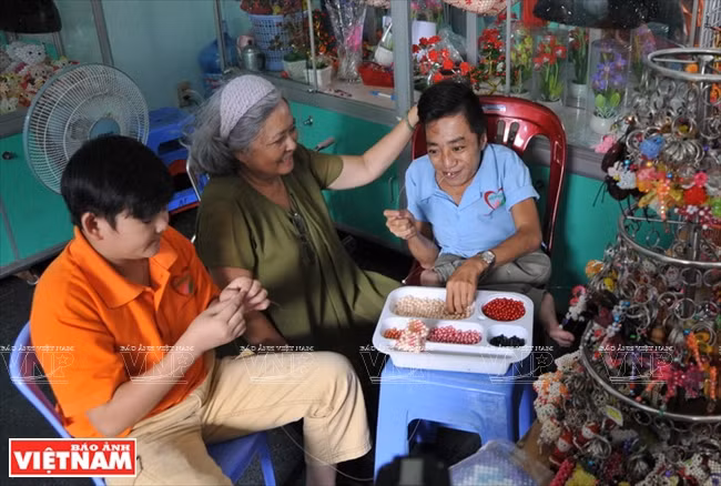 Her pain and sympathy with Agent Orange victims trigger Nga to follow the lawsuit to the last. (Source: VNA)