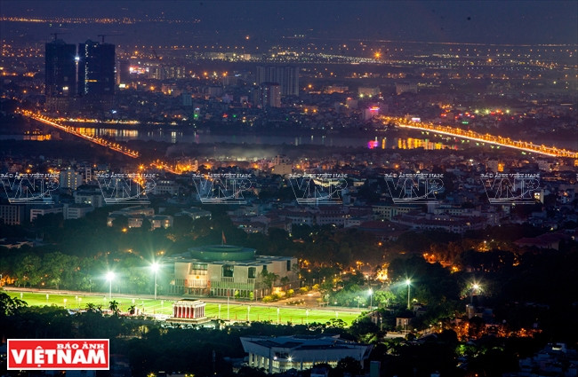 Ho Chi Minh Mausoleum and the National Assembly House, Long Bien Bridge (L) and Chuong Duong Bridge (R) (Source: VNA) 