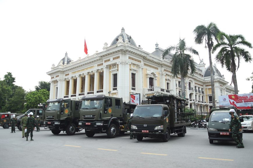 The army’s chemical brigade can be seen all across the capital, especially in high-risk areas. (Photo: Vietnam+)