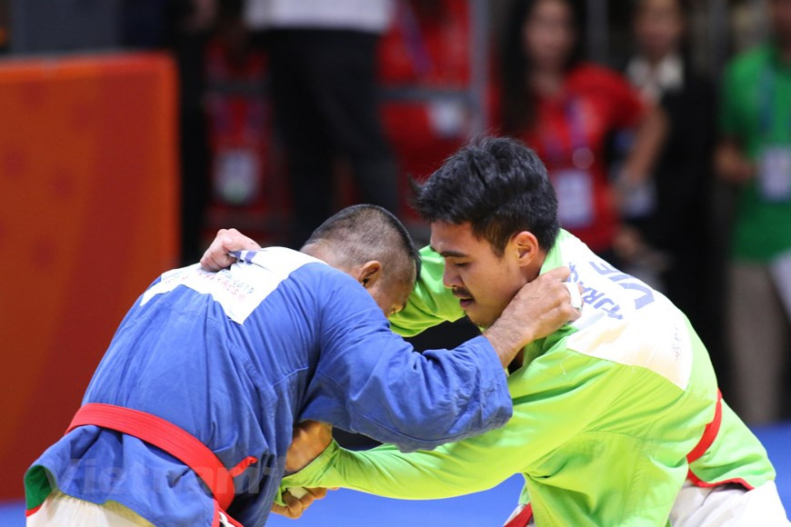 Bui Minh Quan beats his Indonesian rival in the men’s 81kg division (Photo: VNA)