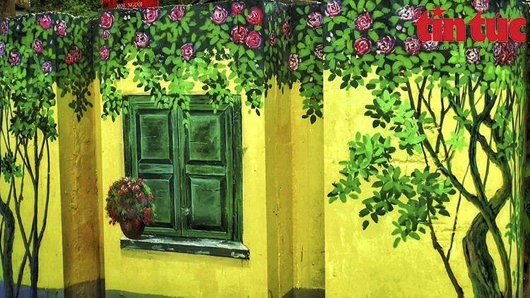 The murals have not only found popularity among local residents but also become an impressive tourism spot in Long Bien district. (Photo: Tin Tuc Newspaper)