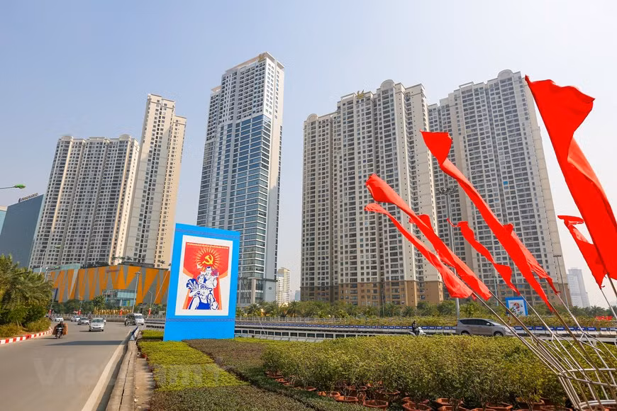 Big size panels are also installed in the area of new buildings in the city to welcome the 13th National Congress of the Party. (Photo: Minh Son/Vietnamplus)