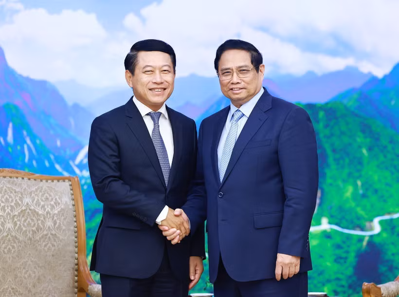 PM Pham Minh Chinh (right) and Lao Deputy PM and Minister of Foreign Affairs Saleumxay Kommasith at their meeting in Hanoi on July 5 (Photo: VNA)