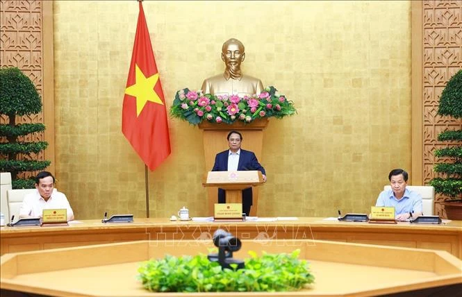 PM Pham Minh Chinh chairs the Government’s law-building meeting on June 13. (Photo: VNA)