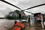 A helicopter prepares to deliver relief supplies to flood-affected areas in south-central provinces. (Photo: VNA)