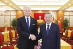 General Secretary of the Communist Party of Vietnam To Lam (right) and Lithuanian President Gitanas Nauseda. (Photo: VNA)