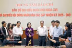 Chairman of the National Assembly and Chairman of the National Election Council Tran Thanh Man visits journalists working at the press centre serving the general election on March 15. (Photo: VNA)
