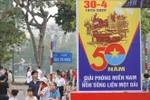 A banner marking the 50th anniversary of the Liberation of the South and National Reunification (Photo: VNA)
