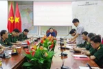 Representatives of relevant units report to Deputy Prime Minister Tran Hong Ha at the meeting. (Photo: VNA)