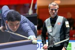 Vietnamese billiards players Bao Phuong Vinh (L) and Tran Quyet Chien compete at the 2025 World Championship 3-Cushion National Teams in Viersen, Germany. (Photo: Union Mondiale de Billard)