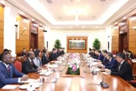 At the talks between Politburo member, Secretary of the Central Committee of the Communist Party of Vietnam (CPV) and Chairman of its Commission for Internal Affairs Phan Dinh Trac and Chan Chun Sing, Assistant Secretary-General of the People’s Action Party (PAP) of Singapore in Hanoi on July 21. (Photo: VNA)