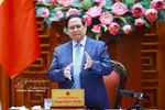 Prime Minister Pham Minh Chinh addresses the event. (Photo: VNA)