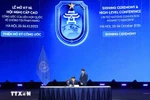 Minister of Public Security Luong Tam Quang signs the UN Convention against Cybercrime (Hanoi Convention). (Photo: VNA)