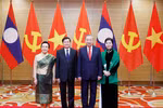 Party General Secretary To Lam and his spouse pose with Lao Party General Secretary and President Thongloun Sisoulith and his spouse in Hanoi on January 26, 2026. (Photo: VNA)