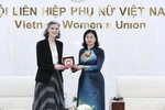 Nguyen Thi Tuyen (R), Vice President of the VFF Central Committee and President of the Vietnam Women's Union, and Ramla Khalidi, UNDP Resident Representative in Vietnam, at their meeting in Hanoi on December 10 (Photo: VNA)
