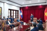 Minister of Public Security Luong Tam Quang visits his ministry's representative office in Laos (Photo: VNA)