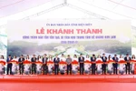 Prime Minister Pham Minh Chinh and delegates cut the ribbon to inaugurate the project to preserve and restore the Him Lam resistance centre relic site (Phase 2). (Photo: VNA)