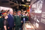 From left: First Secretary of the Communist Party of Cuba Central Committee and President of Cuba Miguel Díaz-Canel Bermúdez (2nd) and his spouse Lis Cuesta Peraza (1st) at the Vietnam Military History Museum in Hanoi on August 31. (Photo: VNA)
