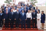PM Pham Minh Chinh (centre, front row) and the USABC delegation. (Photo: VNA)