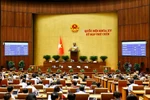 The draft law amending and supplementing a number of articles of the Law on Standards and Technical Regulations is approved with 432 out of 448 participating deputies voting in favour (Photo: VNA)