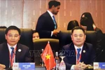 Minister of Finance Nguyen Van Thang (left) and SBV Deputy Governor Nguyen Ngoc Canh at the 12th ASEAN Finance Ministers’ and Central Bank Governors’ Meeting (AFMGM) in Kuala Lumpur, Malaysia, on April 9. (Photo: VNA)