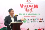 Cao Xuan Thang, Trade Counsellor and Head of the Vietnam Trade Office in Singapore, speaks at the festival (Photo: VNA)