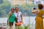 Hoan Kiem Lake, also known as the Returned Sword Lake, is the city's most renowned destinations (Photo: VNA)