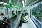 Urban train has become a favourable travel solution for Hanoi's residents. (Photo: VNA)