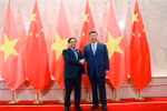 Vietnamese Prime Minister Pham Minh Chinh (L) and General Secretary of the Communist Party of China (CPC) Central Committee and President of China Xi Jinping at their meeting on August 31. (Photo: VNA)
