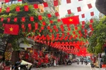 A street in Hanoi is brightly decorated with flags, flowers, banners and posters to celebrate the 80th National Day (September 2). (Photo: VNA)
