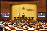Lawmakers at the 9th session of the 15th National Assembly (Photo: VNA)