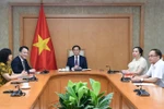 Deputy Prime Minister Bui Thanh Son (C) holds a phone call with Kaja Kallas, Vice President of the European Commission and EU High Representative for Foreign Affairs and Security Policy (Photo: VNA)