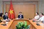 Deputy Prime Minister Bui Thanh Son (C) holds a phone call with Kaja Kallas, Vice President of the European Commission and EU High Representative for Foreign Affairs and Security Policy (Photo: VNA)