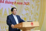Prime Minister Pham Minh Chinh, head of the National Steering Committee on Semiconductor Industry Development, chairs the committee’s second meeting in Hanoi on August 4. (Photo: VNA)