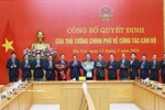 The appointment decision handover ceremony is held in Hanoi on March 12. (Photo: VNA)