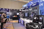 Visitors explore a technology exhibition on cybersecurity and safety equipment. (Photo: VNA)