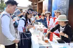A view of a stall at the second Jade Dragon Snow Mountain coffee festival in Baisha ancient town, Yunnan’s Lijiang city. (Photo: VNA)