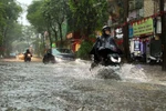 Hanoi is likely to see widespread precipitation ranging from 50-100 mm due to effects of Typhoon Matmo. (Photo: VNA)
