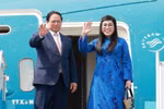 Prime Minister Pham Minh Chinh, his spouse Le Thi Bich Tran leave Hanoi on July 4 afternoon for Brazil to attend the expanded BRICS summit. (Photo: VNA)