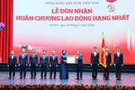 PM Pham Minh Chinh bestows the first-class Labour Order on the SBV (Photo: VNA)