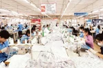 Garment production for export at Hoa Tho Garment JS Corporation. (Photo: nhandan.vn)