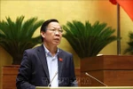 Phan Van Mai, Chairman of the National Assembly’s Committee for Economic and Financial Affairs, delivers a report presenting explanations, feedback, and revisions to the amended draft Law on Corporate Income Tax. (Photo: VNA) 