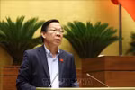 Phan Van Mai, Chairman of the National Assembly’s Committee for Economic and Financial Affairs, delivers a report presenting explanations, feedback, and revisions to the amended draft Law on Corporate Income Tax. (Photo: VNA) 